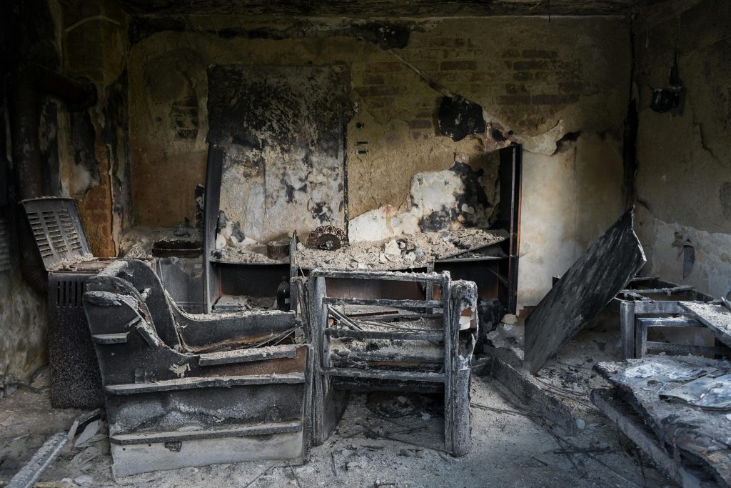 An interior of a home burned by fire.